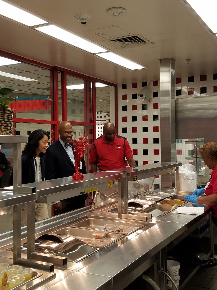 SpringISD's tweet photo. .@RodneySpringISD and @Shuester taking a quick lunch break. @SpringISD_Meals #New2Spring #Students2Spring #ChickenNachos #EveryDayCounts https://t.co/yhal5SxXeM
