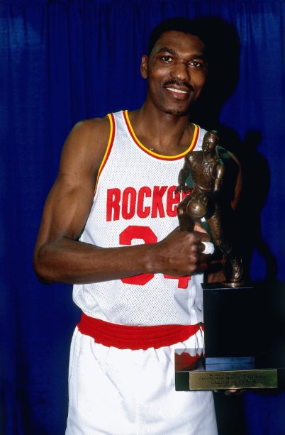 NBAHistory's tweet photo. Hakeem Olajuwon/1993-94: First player to be named NBA MVP, NBA Def. POY & NBA Finals MVP in the same season; "Clutch City" @NBATV 8 pm/et https://t.co/WG72nDwlwa