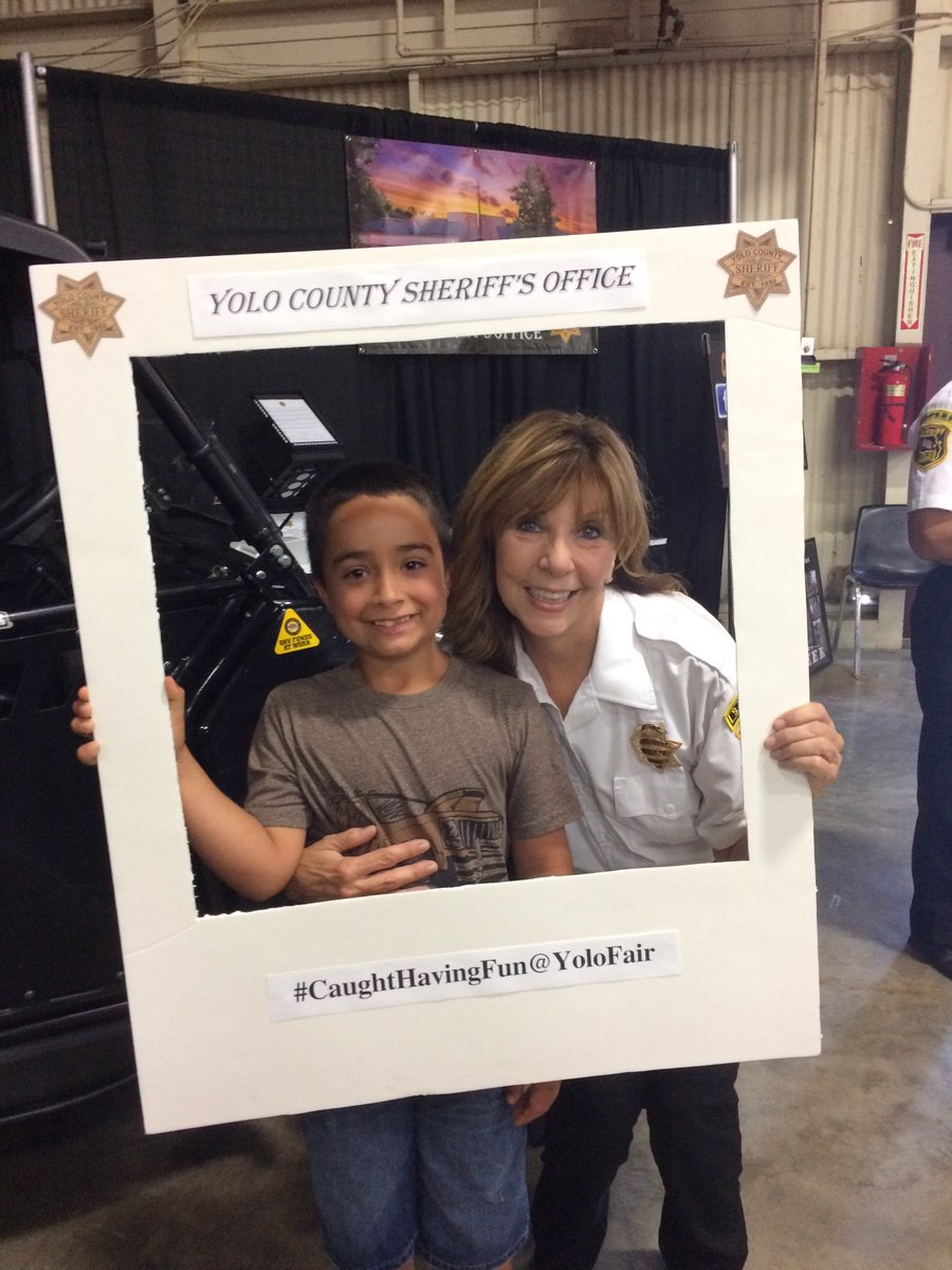YoloCoSheriff's tweet photo. Stop by the Sheriff's Office booth during the fair this week and take a picture with our Selfie Frame!!  
#CaughtHavingFun@YoloFair https://t.co/b6dlX0OS31