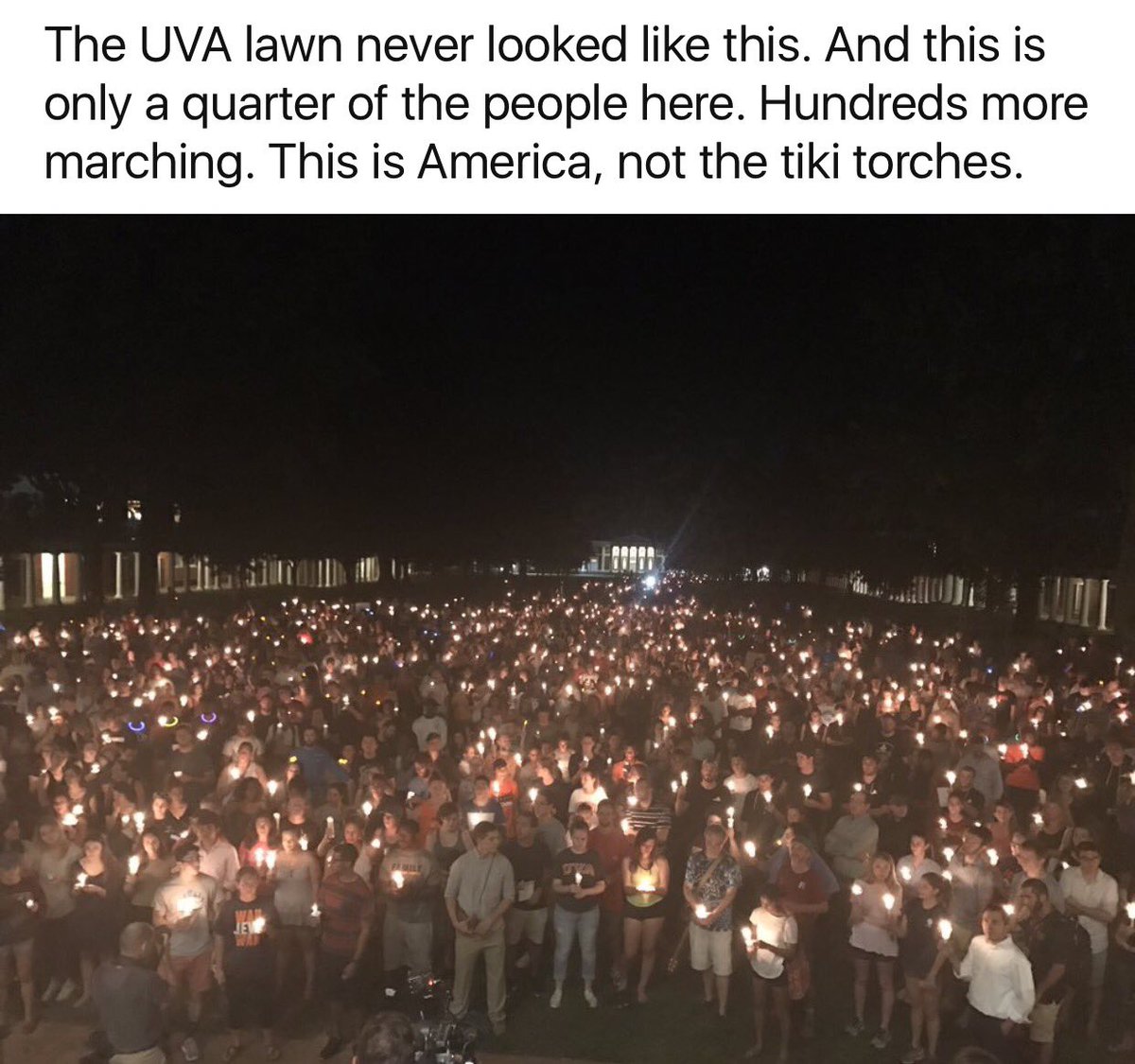 DrDreuss's tweet photo. THIS is America. Not the tiki torches.
#embracism
(Memorial for Heather Heyer) https://t.co/BxQLNmGYEP