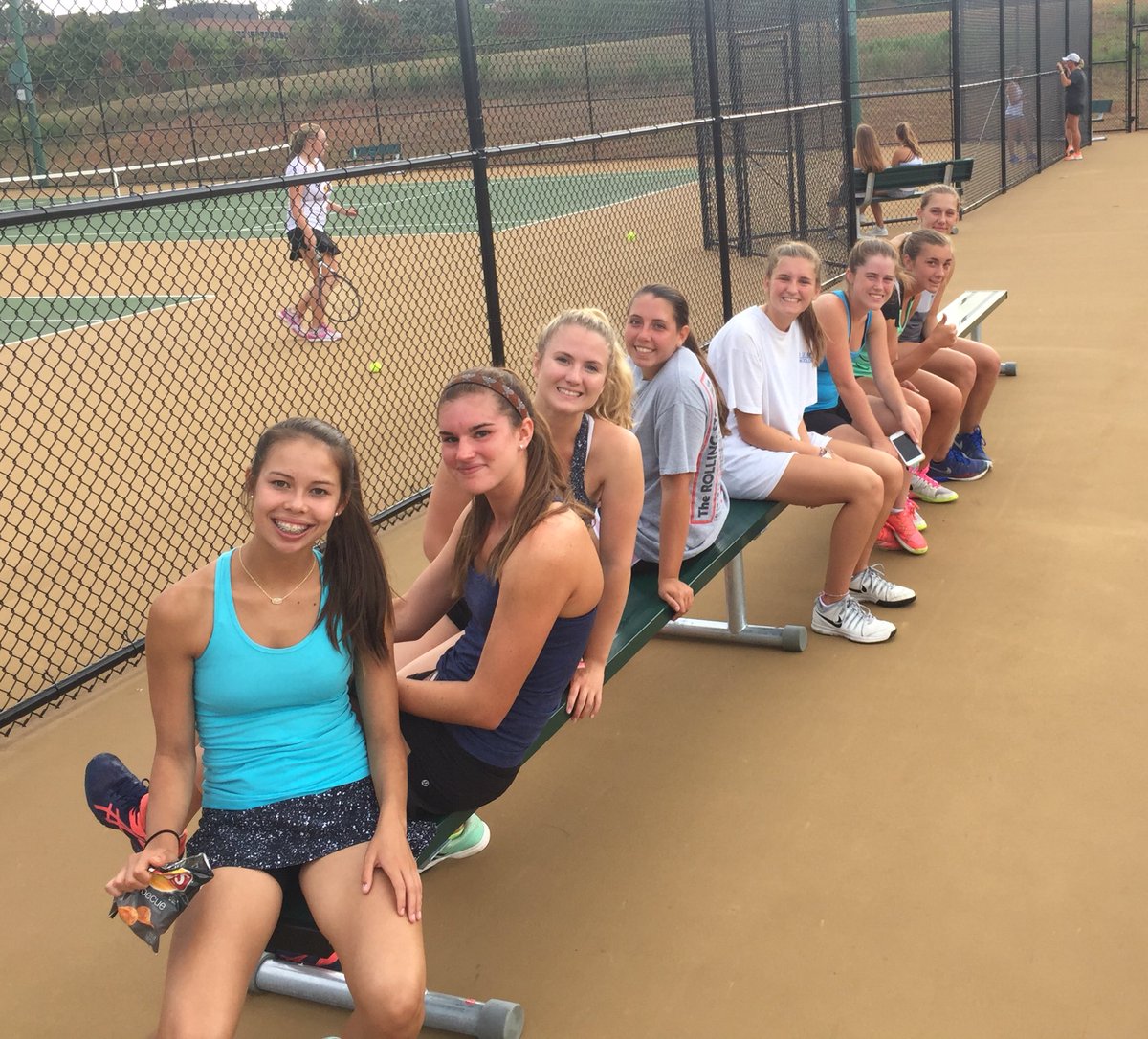 Tennis_cghsnc's tweet photo. The Varsity team wrote notes of encouragement to the JV team, then helped dry the courts &amp; cheer them on during their first match.  #Family https://t.co/MY78TvzO5o
