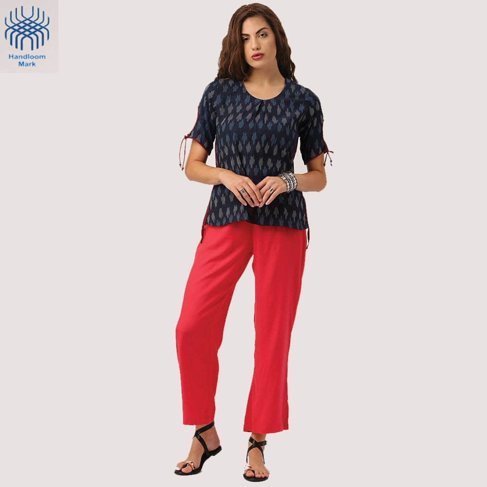IndusDiva's tweet photo. Now jazz up your look wearing this stylish Ikat top with cut-out and tie-up on the sleeves. #IndusDiva. Exclusive on @Myntra https://t.co/WKs7lQkLak