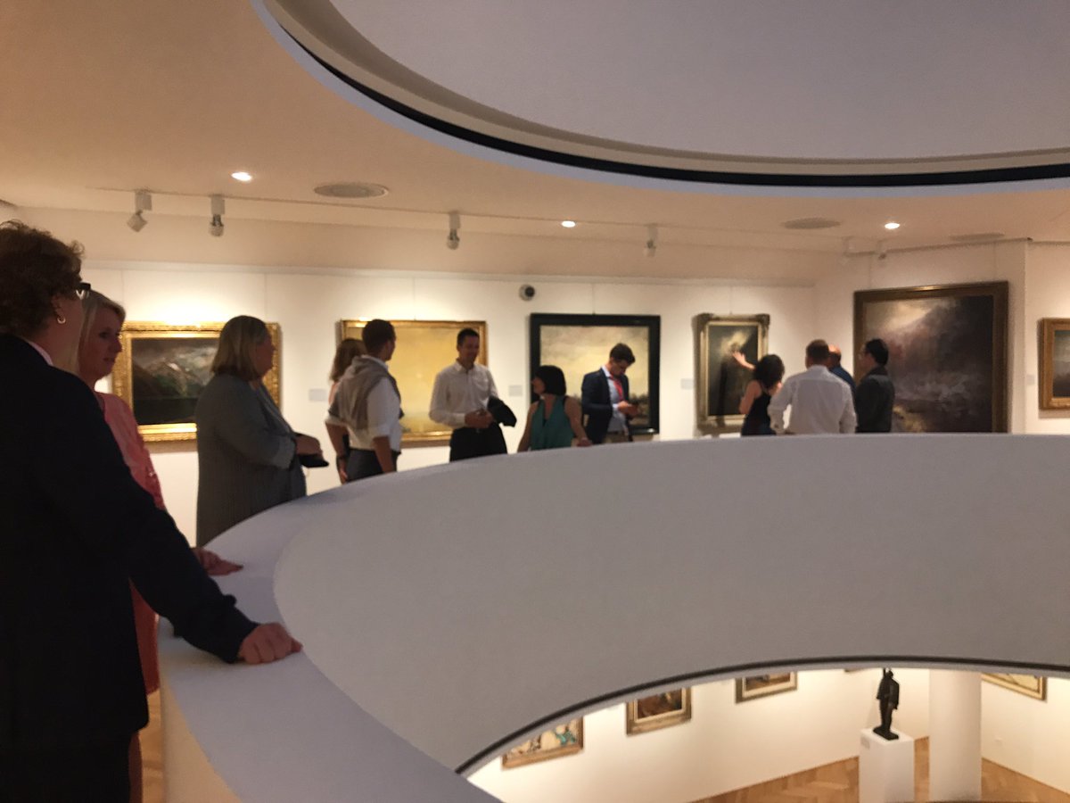 Art gallery with an open exhibition area at the bottom floor for drinks receptions with 4 cylindrical floors of art #BratislavaFAM