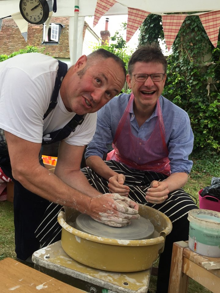 Keith Brymer Jones putting local MP Greg Clark through his paces on the potter's wheel at Matfield village fete @KBJWhitstable @GregClarkMP