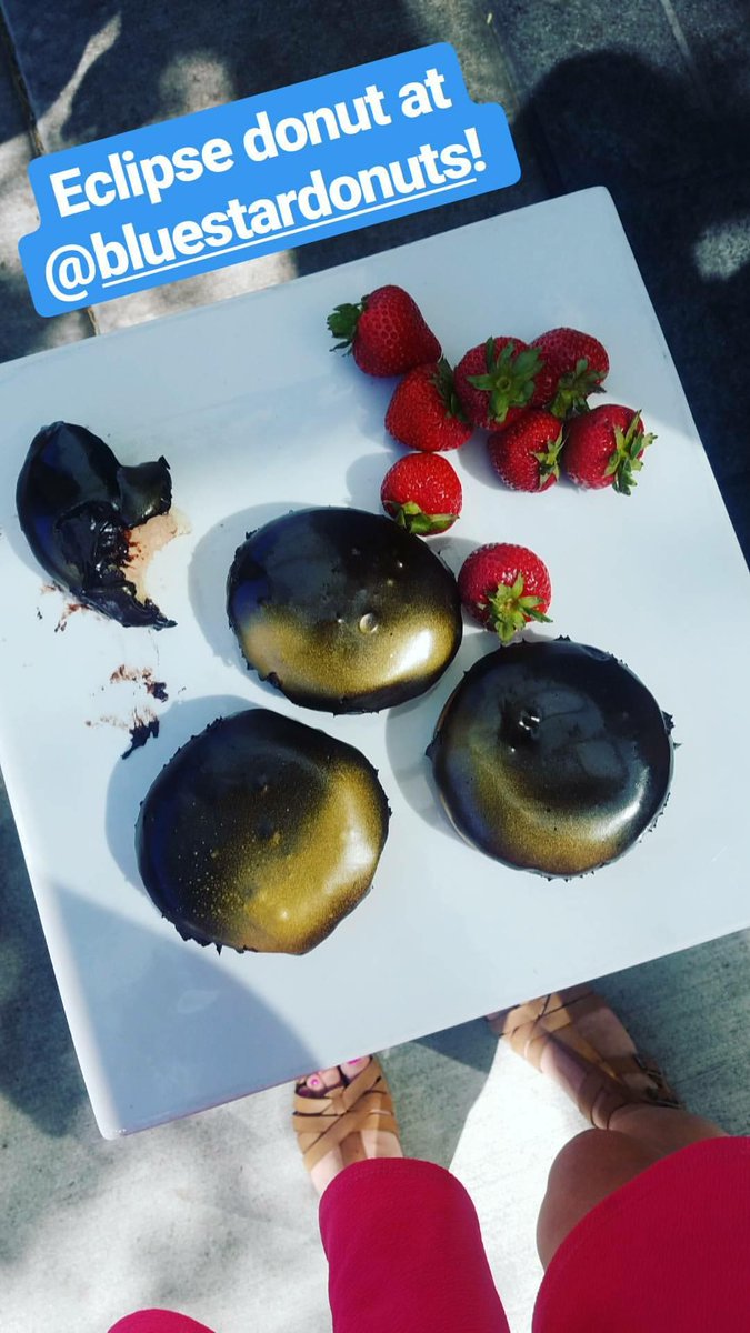 I'm on an eclipse-themed dessert mission today... First stop - <a href="/BlueStarDonuts/">Blue Star Donuts</a>! This dark chocolate, strawberry, and gold combo is tasty!