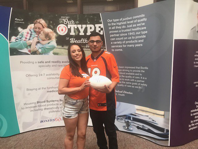 VitalantCO's tweet photo. Congrats to Ashley C. who stopped by our booth at Broncos training camp &amp; won a Ty Sambrailo signed football. #JustOurType https://t.co/7O2pbEqbFB