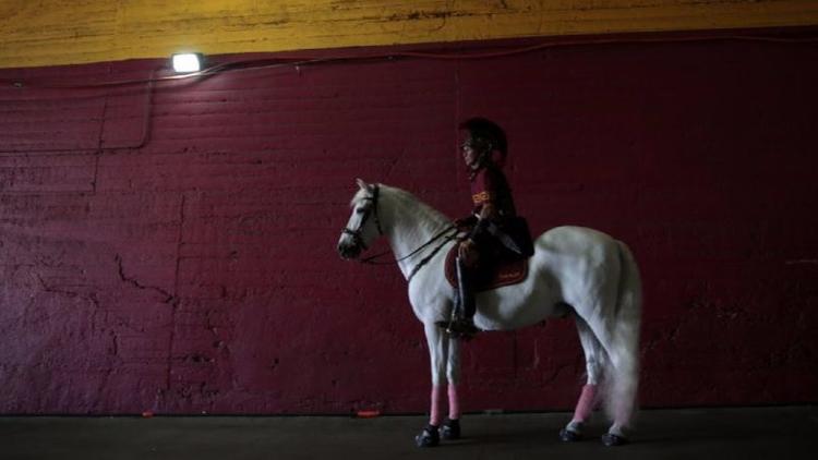 USC mascot Tommy Trojan and his white horse  now considered racist