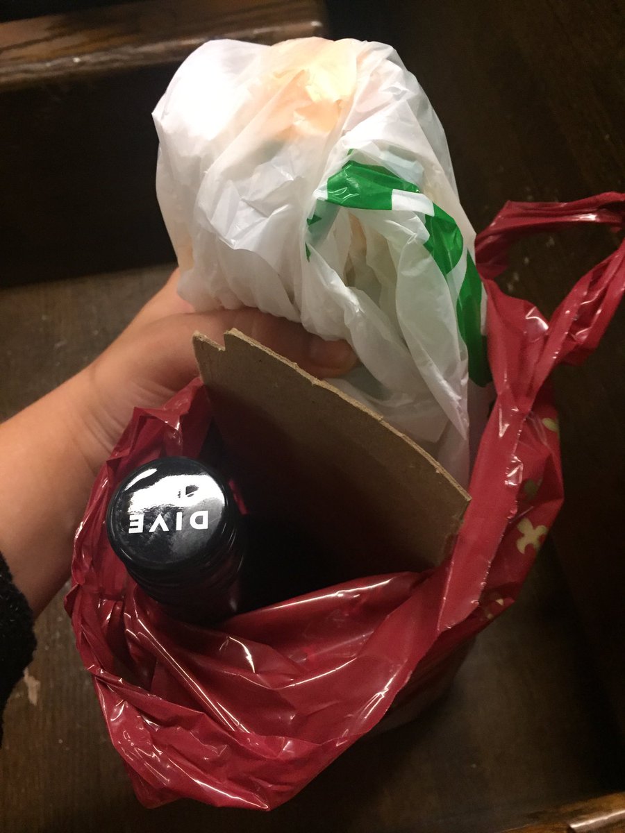 peoplepersson's tweet photo. It may look like I got 2 bottles of wine but rly I asked for a divider so I could put my wine AND my sub in #whoisshe #shesacatch https://t.co/MOEIn1k3pZ