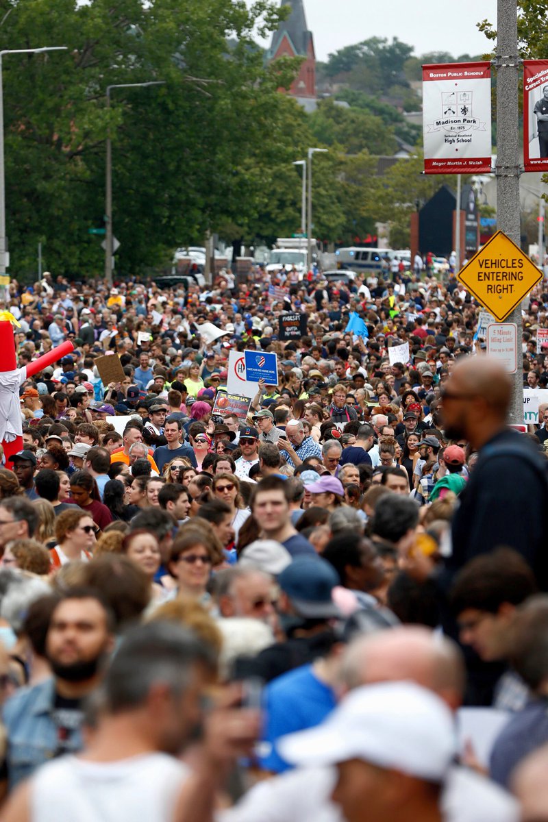 BostonGlobe's tweet photo. A look at the crowds marching from Roxbury to Boston Common to protest the #BostonFreeSpeech rally. Live updates: https://t.co/rwNTtEcuzf https://t.co/SLBF52N0b1