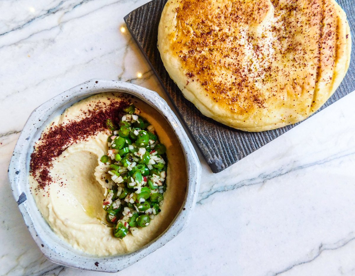 Homemade pita, ready to take a dip. 😋