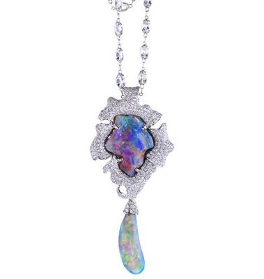Lily Pendant by Katherine Jetter. Lightning Ridge Black Opal set in handmade 18K gold white pendant.  ow.ly/UE9N3074ac6