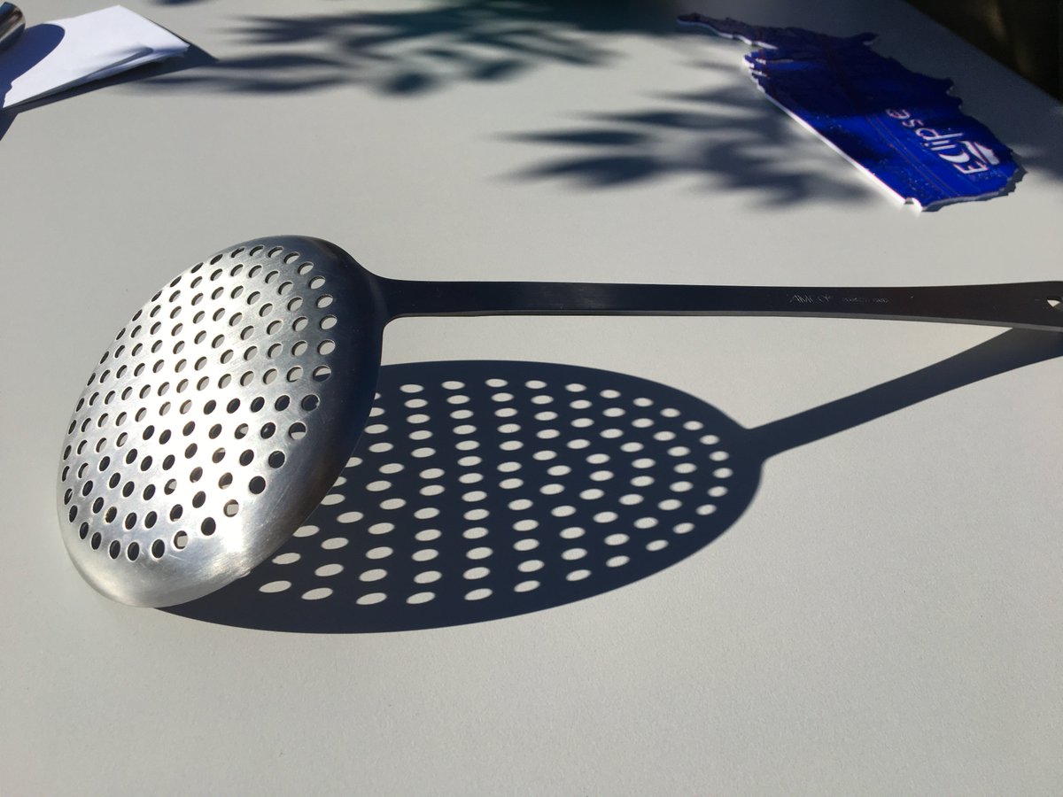 exploratorium's tweet photo. #eclispe2017 chasers! Your task: Find household items w/ tiny holes. Pinholes show image of sun &amp; will be crescents when eclipse starts. 🌙 https://t.co/hfVnaNhswC