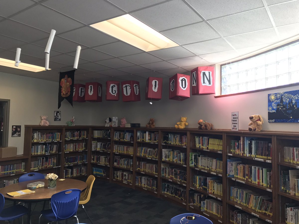 Bookbosss2012's tweet photo. Had wonderful help today making the library @NorthwestES even more magical! Thx @hcbcpf for your help!! #harrypotterlibrary #happylibrarian https://t.co/lrxjrkWKWK