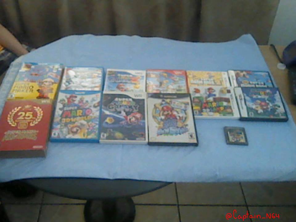 Captain_N64's tweet photo. A bit late but here are all my Mario games for #NothingButMarioWeek It's an old photo but those are all the ones I have, minus digital games https://t.co/NViMebShHL
