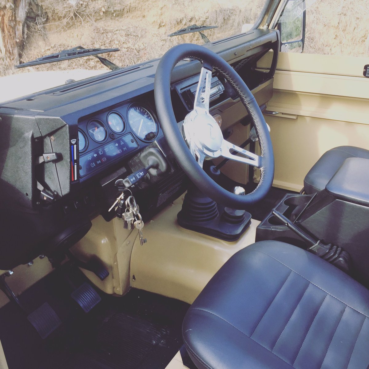 Simple interior in the Beach Rover is practical and stylish. Relocated the handbrake for a more comfortable driving position. <a href="/ExmoorTrim/">Exmoor Trim</a>
