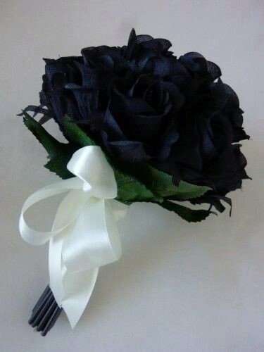 Dolohov charms a rose bouquet to appear at <a href="/JoeysSecretRose/">Katherine Greyback</a> door.