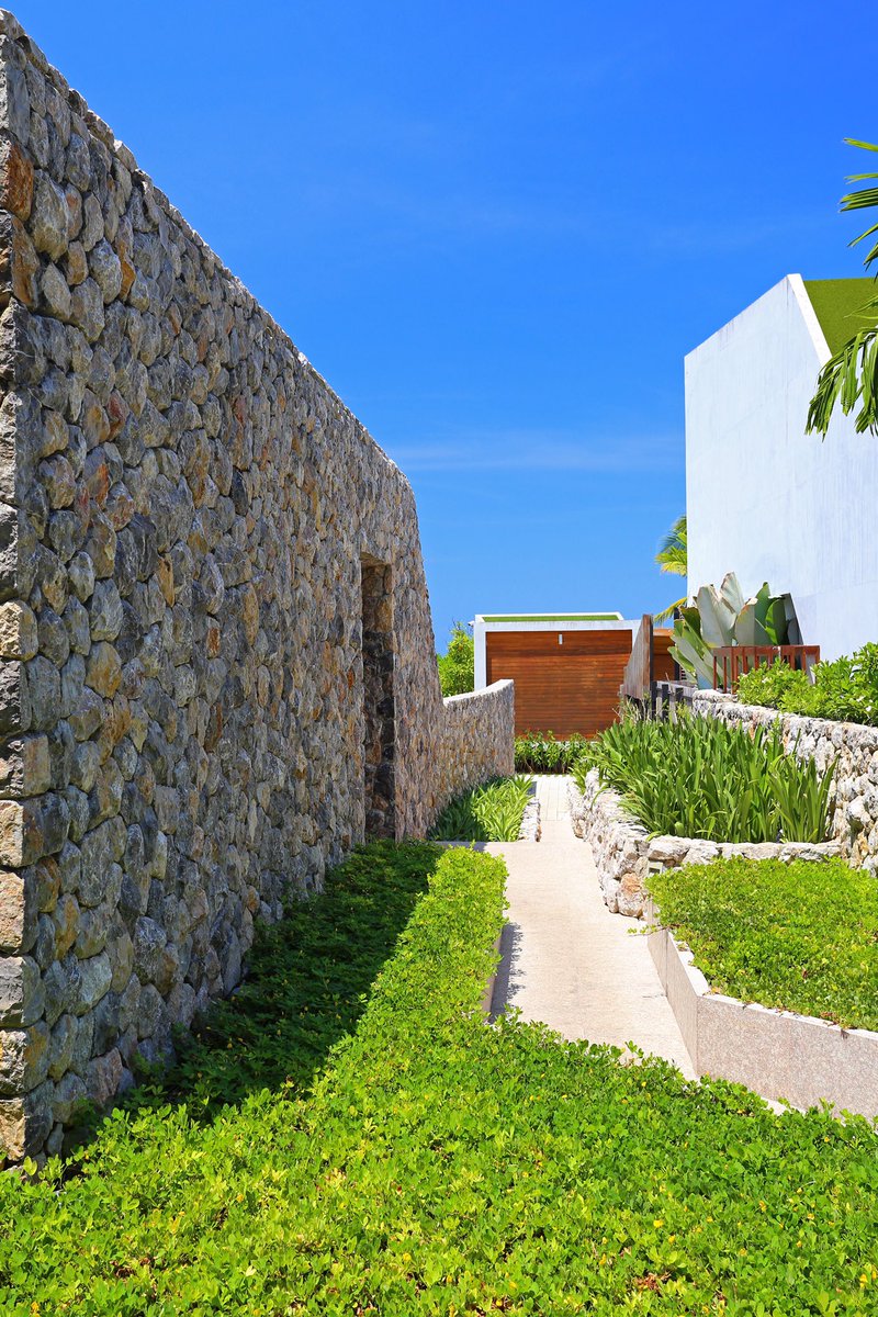 Charming architecture is appointed adjacent to the greenery and underneath the blue skies

#designhotel #casadelaflora #khaolak #hotel