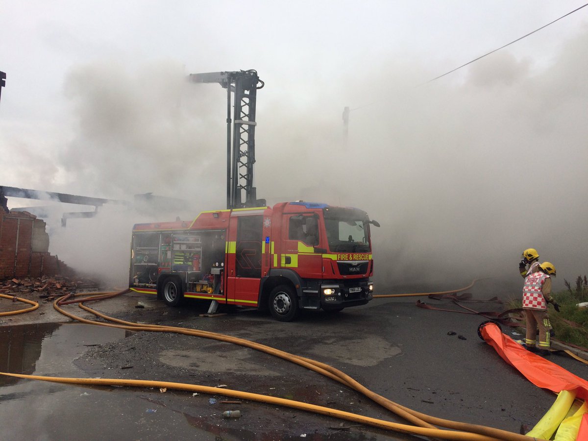 Whittwoo506's tweet photo. Large recycling fire ongoing in Blackburn. Environmental Protection also a priority with Leeds/Liverpool canal adjacent!! @LancashireFRS https://t.co/yQ7TBkTelj