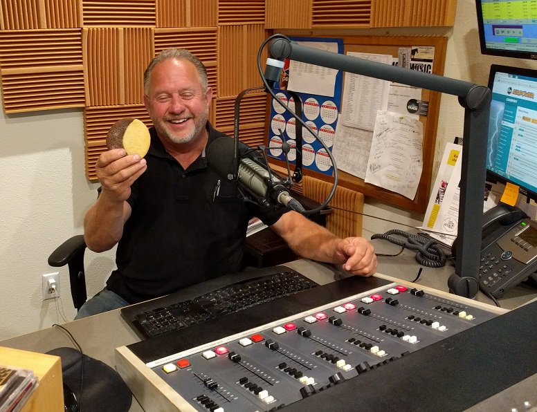 HaystackB's tweet image. Gorge Country Y102's Stan Fargher with his Eclipse Cookie from Julie Reynolds.  Yum!