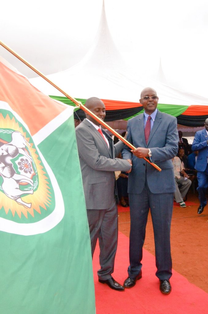 KBCChannel1's tweet photo. HE @JohnMruttu Handing over the instruments of power to Governor Granton Samboja after his swearing in #CountyTransition ^CW https://t.co/DuzvQLTqwY