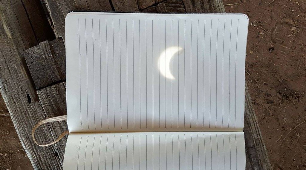 Viewing  #SolarEclipse the old fashioned way thru hole in barn roof at Barrington #LivingHistory Farm near Brenham