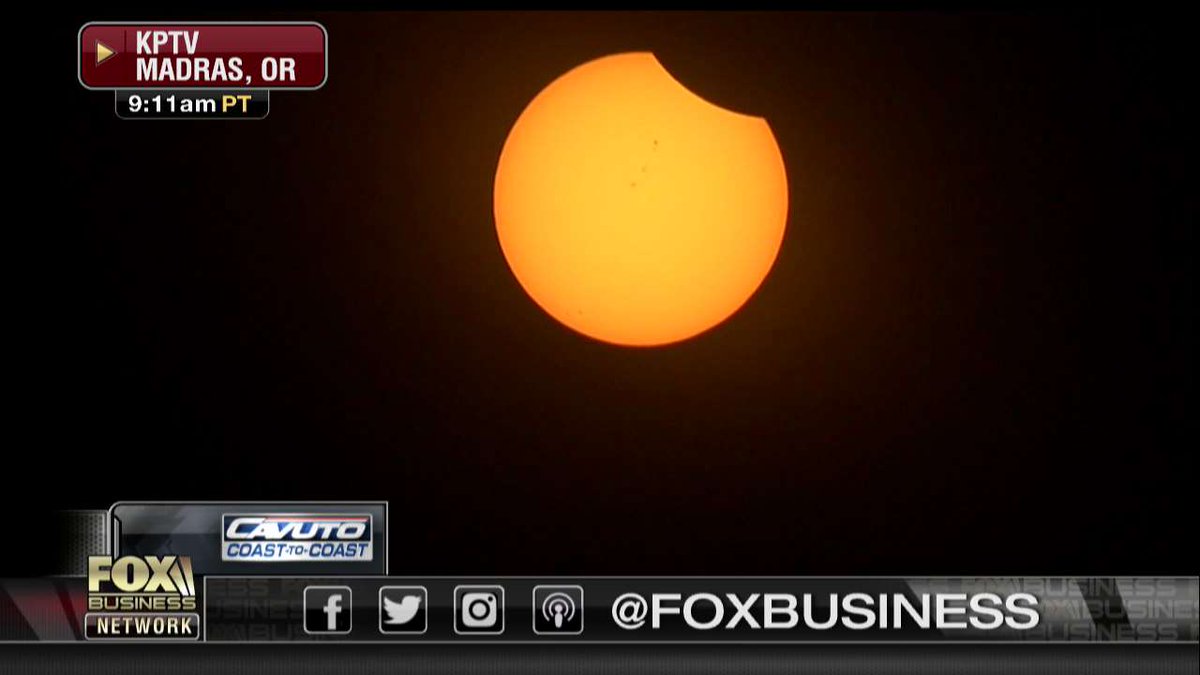 FoxBusiness's tweet photo. ECLIPSE BEGINS: Live shot of the eclipse from Madras, Oregon. #Eclipse2017 https://t.co/KxyOi5Yosu