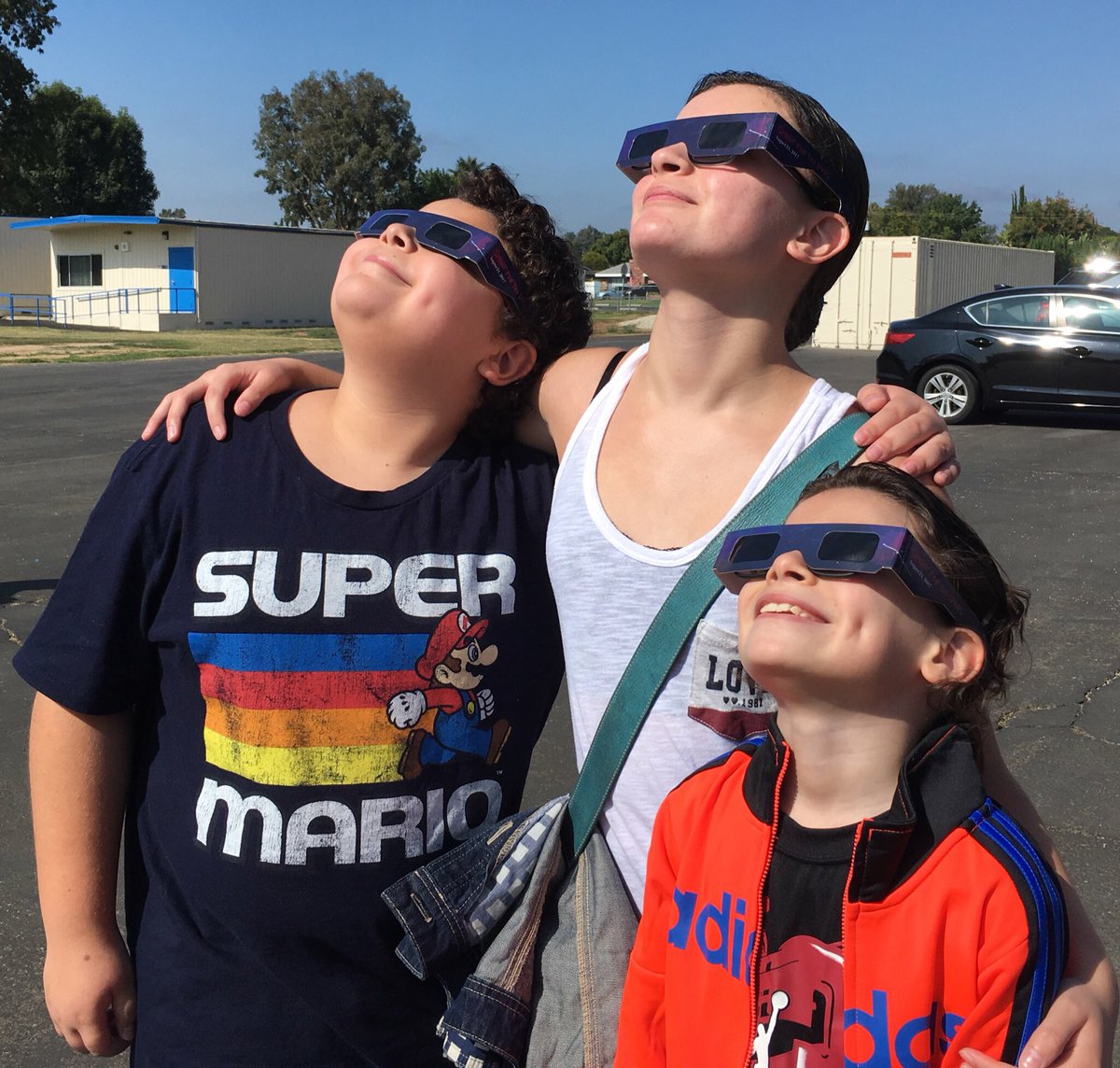 Bruce_Salomon's tweet photo. Having so much fun with @RaphaelAlejandr and @Dalila_Bela1 watching the solar eclipse!! 😀👏 https://t.co/ruz71DWxzL