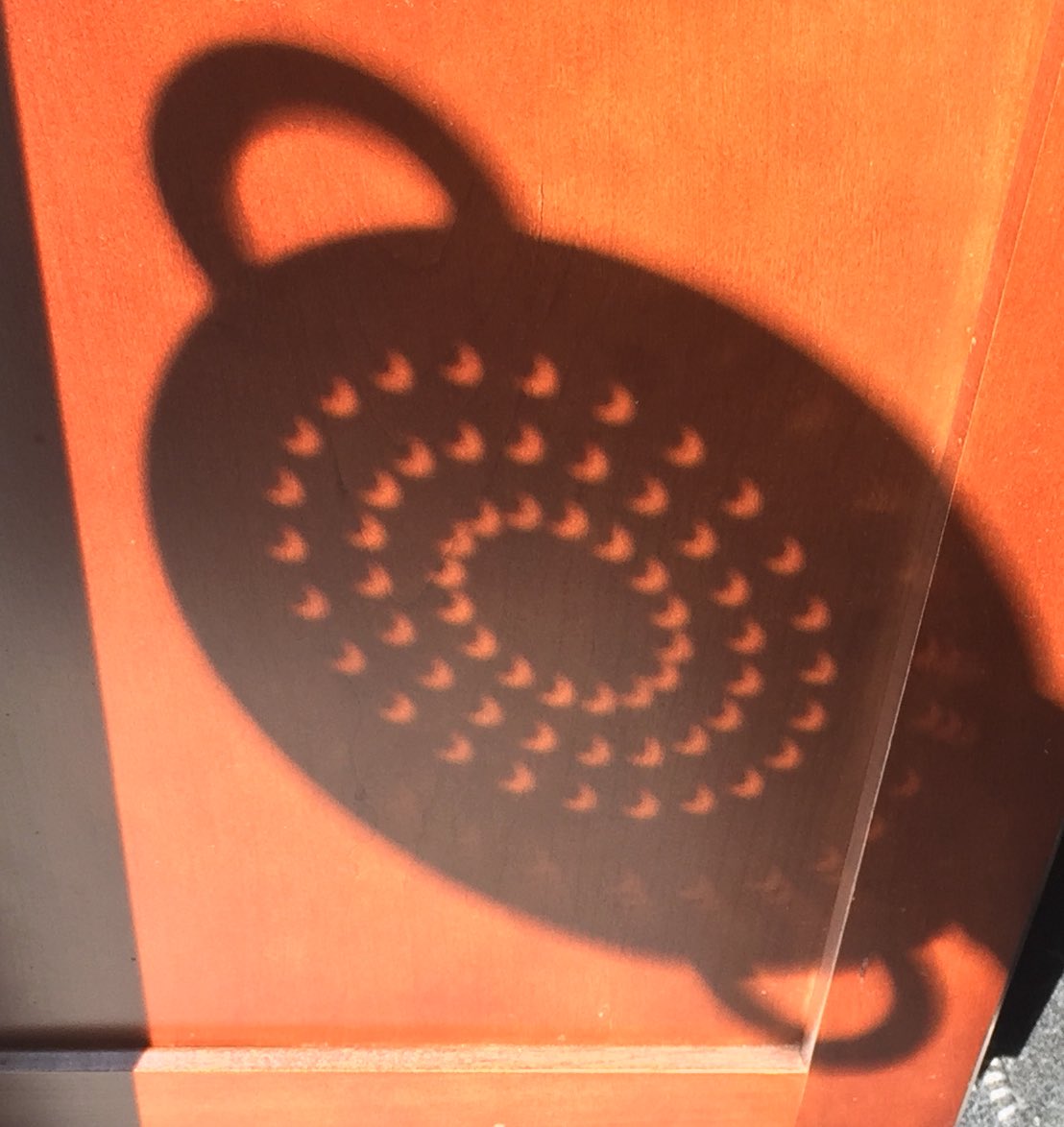 Hack to see solar eclipse through a colander #SolarEclipse2017
