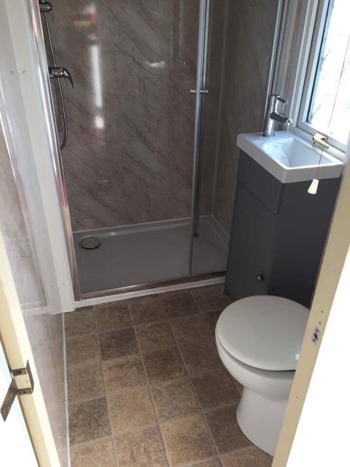 Bath ripped out in a static caravan and new shower and toilet fitted