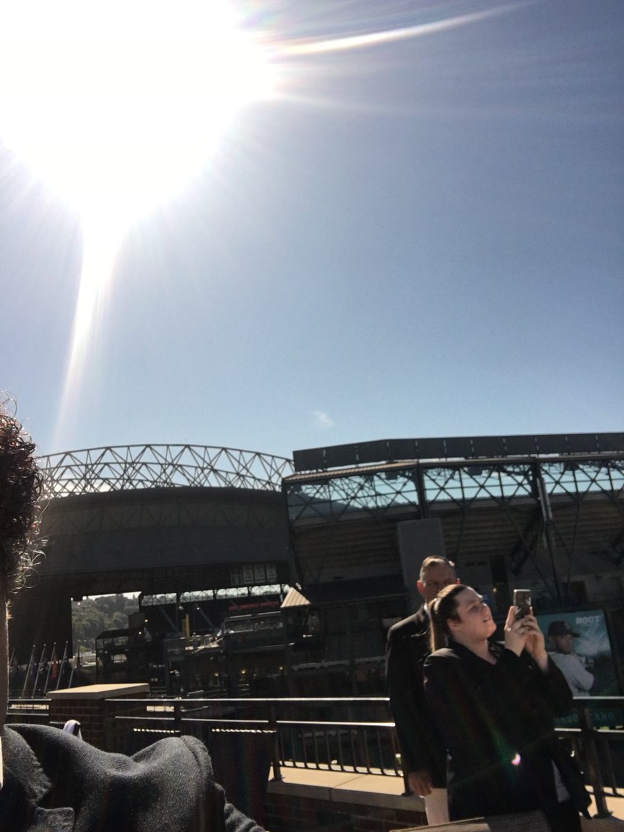 Stadium_SC's tweet photo. Some of our staff watching the eclipse from the rooftop pool #Eclipse https://t.co/3yGztPgbbh
