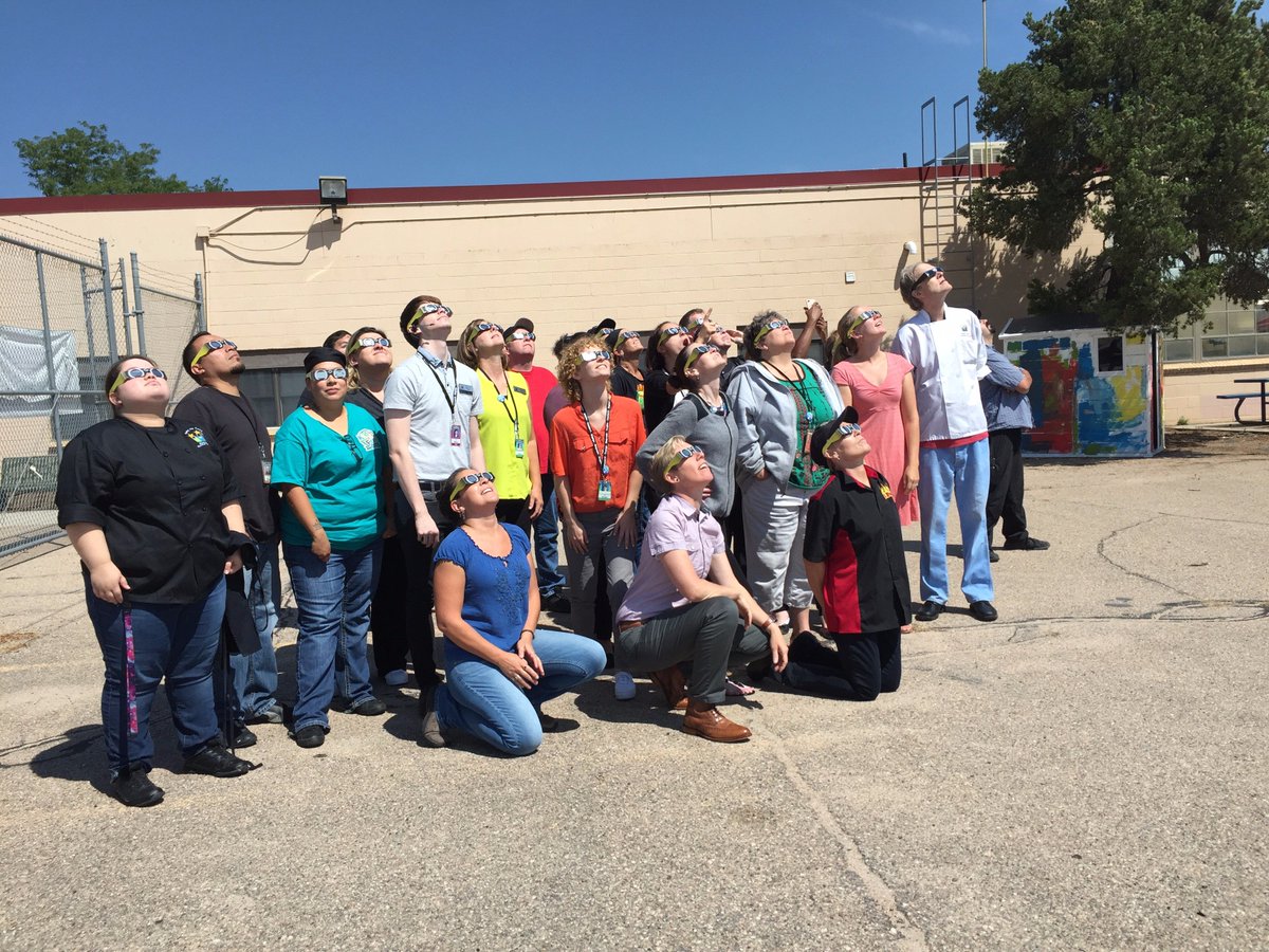 Taking a quick break from making delicious meals to watch the moon pass over the sun #ImDistrict6