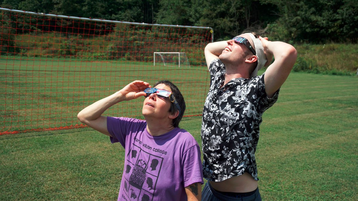 WWCasheville's tweet photo. The campus community gathered at the soccer field to watch #SolarEclipse2017. #AVLeclipse #SolarEclipse #avl @WLOS_13 @asheville @WBTV_News https://t.co/lRJ2mReP0F