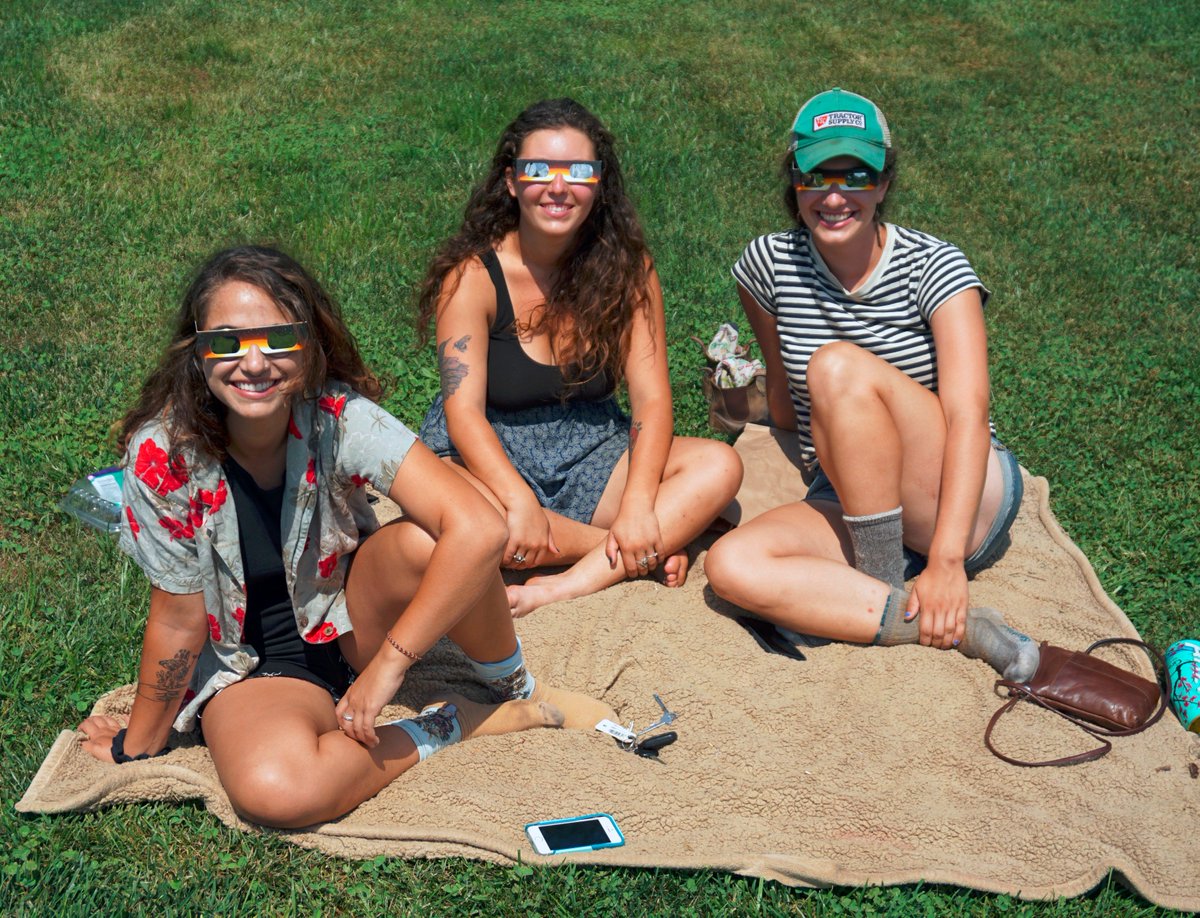 WWCasheville's tweet photo. The campus community gathered at the soccer field to watch #SolarEclipse2017. #AVLeclipse #SolarEclipse #avl @WLOS_13 @asheville @WBTV_News https://t.co/lRJ2mReP0F