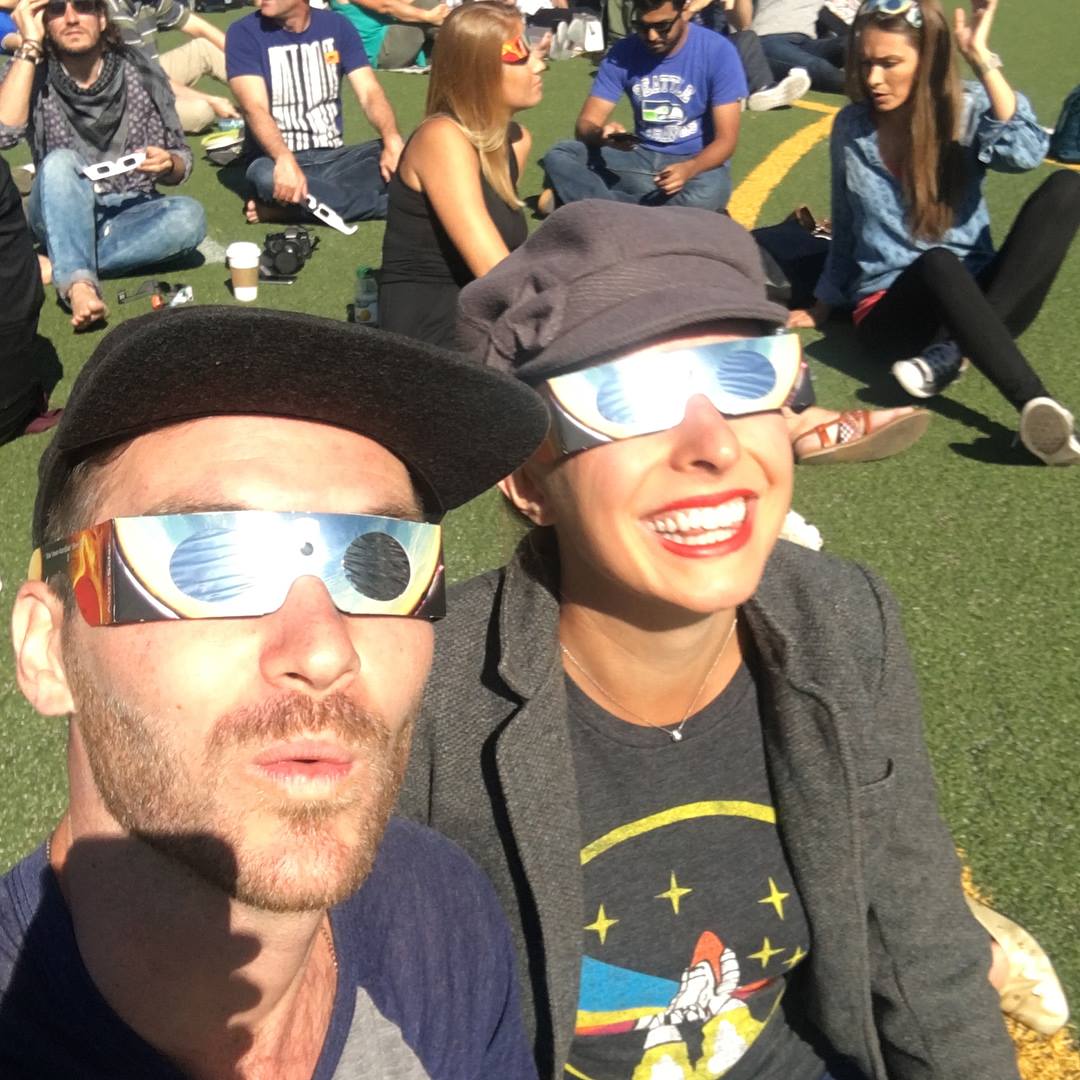 jules602's tweet photo. The hubs and I taking a break from work and taking in the view at Nike's campus in Oregon #totalitystoked #preparetobeclipsed #EclipseTODAY https://t.co/uZQqdHlBN1