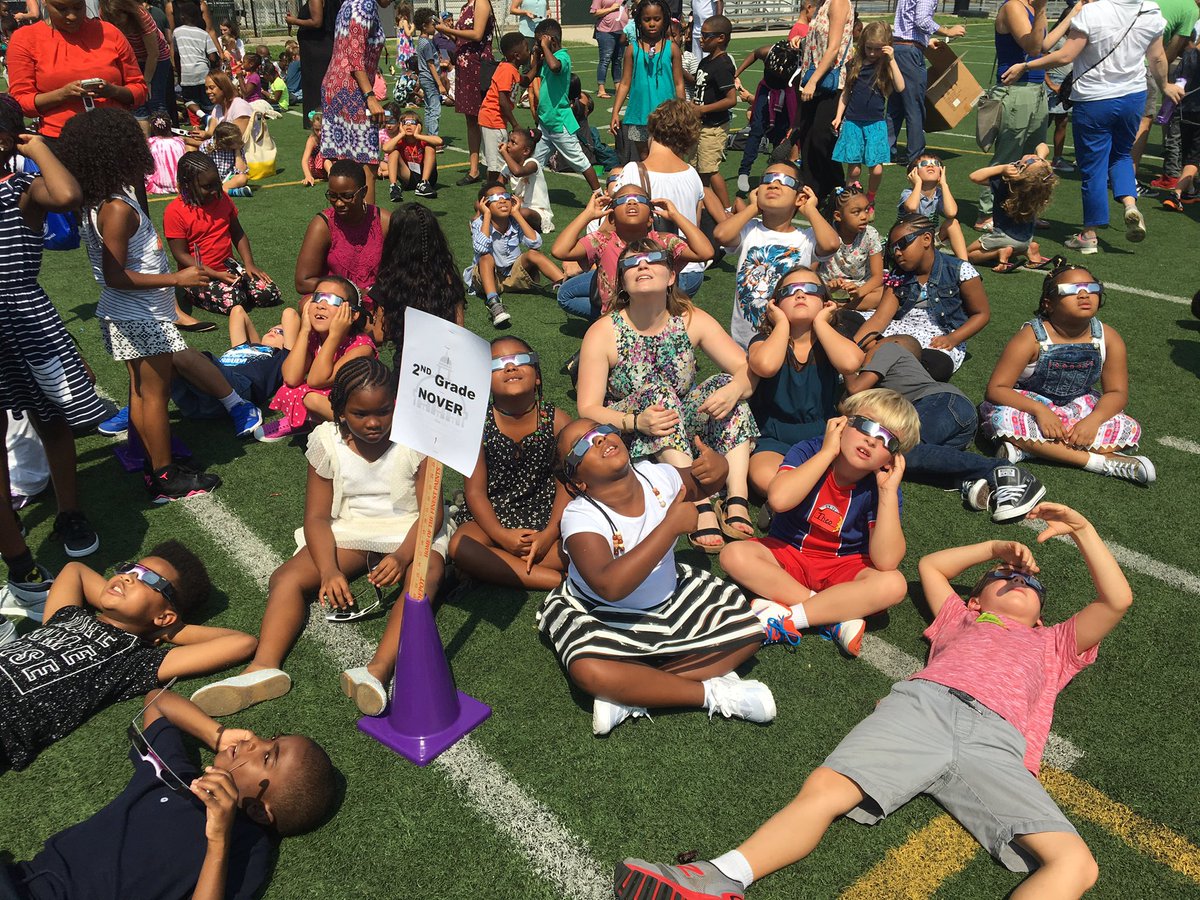 MsNover14's tweet photo. First day of 2nd Grade AND a solar eclipse?!? Jackpot! Thanks @CHCSPTA for our stylish glasses! https://t.co/jOLyAL4OkC