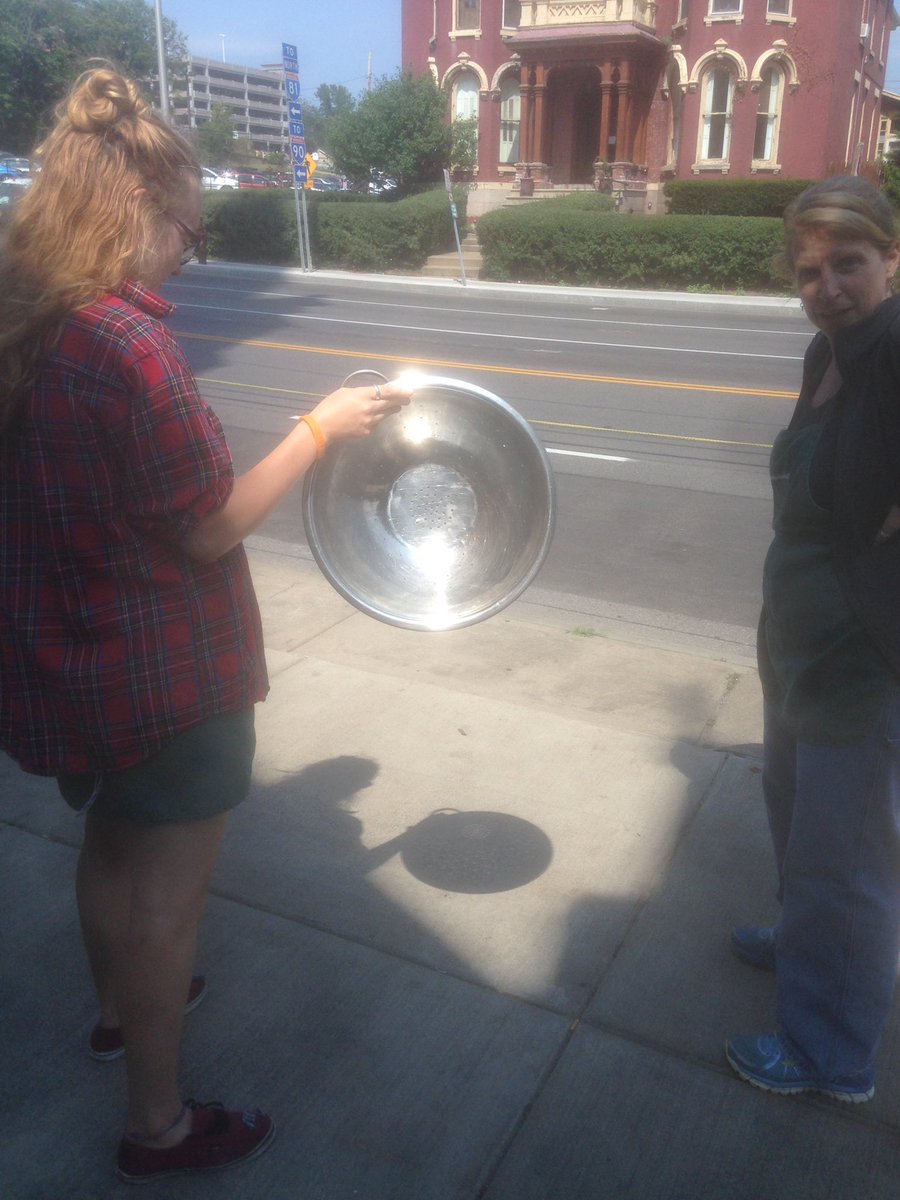 TheSamCenter's tweet photo. #SolarEclispe2017 at @TheSamCenter - we forgot our glasses but used a colander to see the crescent sun! https://t.co/cJR4RMuQLA
