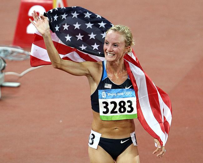 runnersworld's tweet photo. .@ShalaneFlanagan traded in her 2008 Olympic bronze medal for silver today https://t.co/CXUY2t5FjD https://t.co/QsL7Vkl5A9