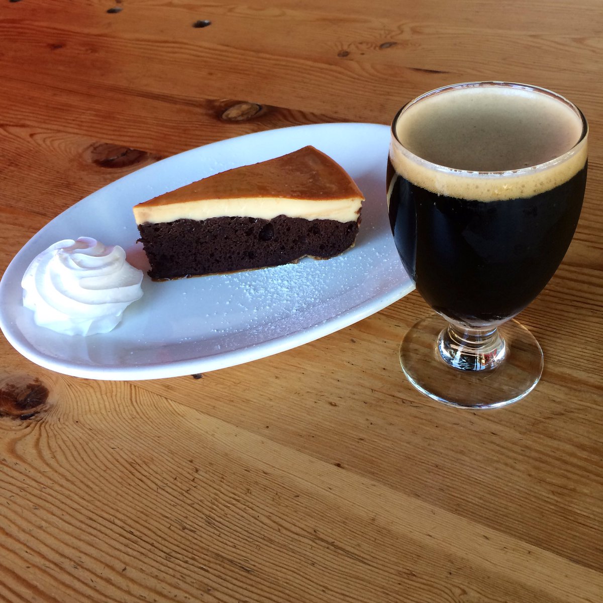 Eclipse chocolate flan cake and a Slow Train Porter. Treat yo self. 🍻