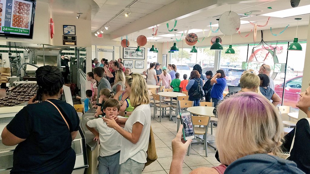 MarcieMcNeal's tweet image. I spy students along w/IT data manager @chazon64  investing in a 1 of a kind @krispykreme eclipse donut!