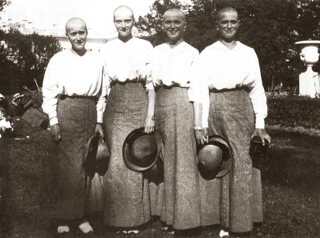 Picture of Anastasia N Romanova in 1917 the garden of the Alexander Palace. The grand duchesses had their heads shaved in the spring of 1917 following a bout with measles. From left to right, Grand Duchesses Anastasia, Tatiana, Olga and Maria Nikolaevna. 