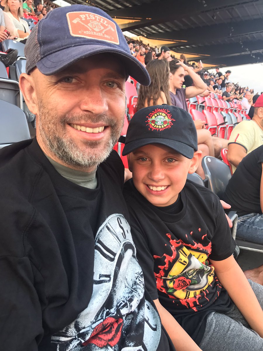 Ewa_Johnson's tweet photo. My husband crossing things off his #BUCKETLIST while beating brain cancer! While introducing our son to @gunsnroses #Ottawa https://t.co/j1tnHSGLYu