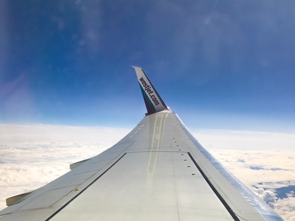 Vacation_Couple's tweet photo. Enjoying the wi-fi all the way up! ⛅️🛩✨ @westjet #WestJet #MostCanadian https://t.co/VPrFRTh3ji