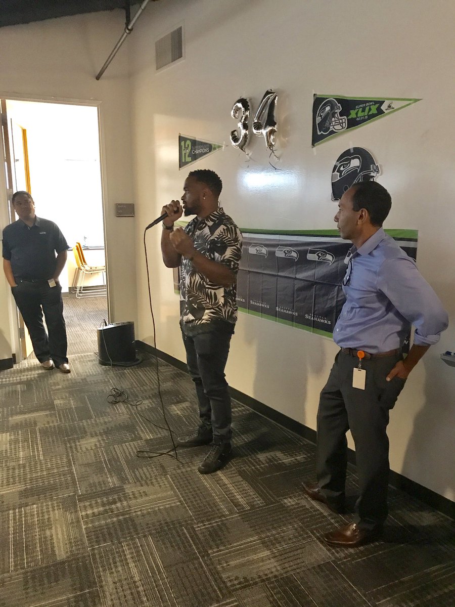 Apptio's tweet photo. Kicking off the football season 🏈 with some pizza, wings and Q&amp;A from @Seahawks @TRawls810! #bleedorange https://t.co/lSRdIdBcWq