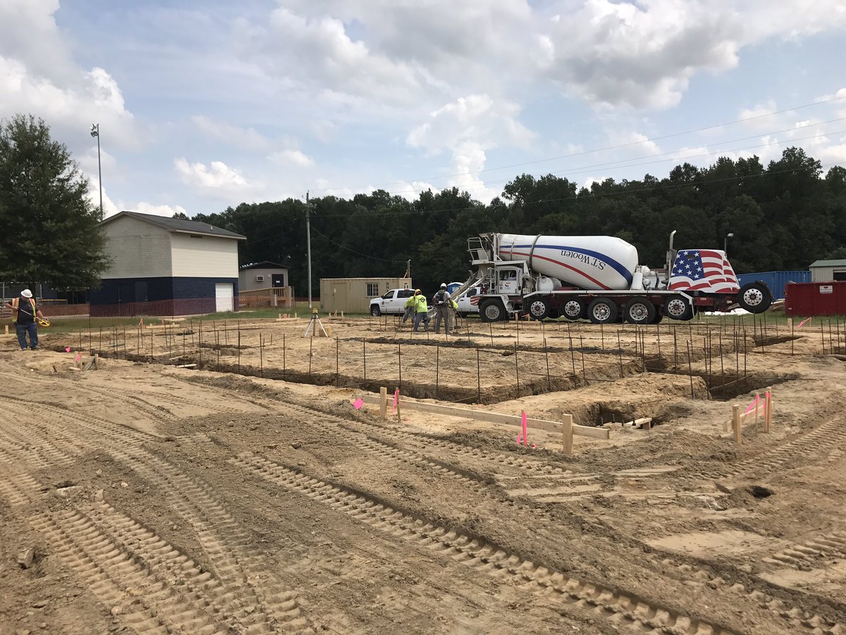 Improvements are underway at SSS!  Foundation for new locker room facility and framing for the new metal roof. #jcpsfacilities