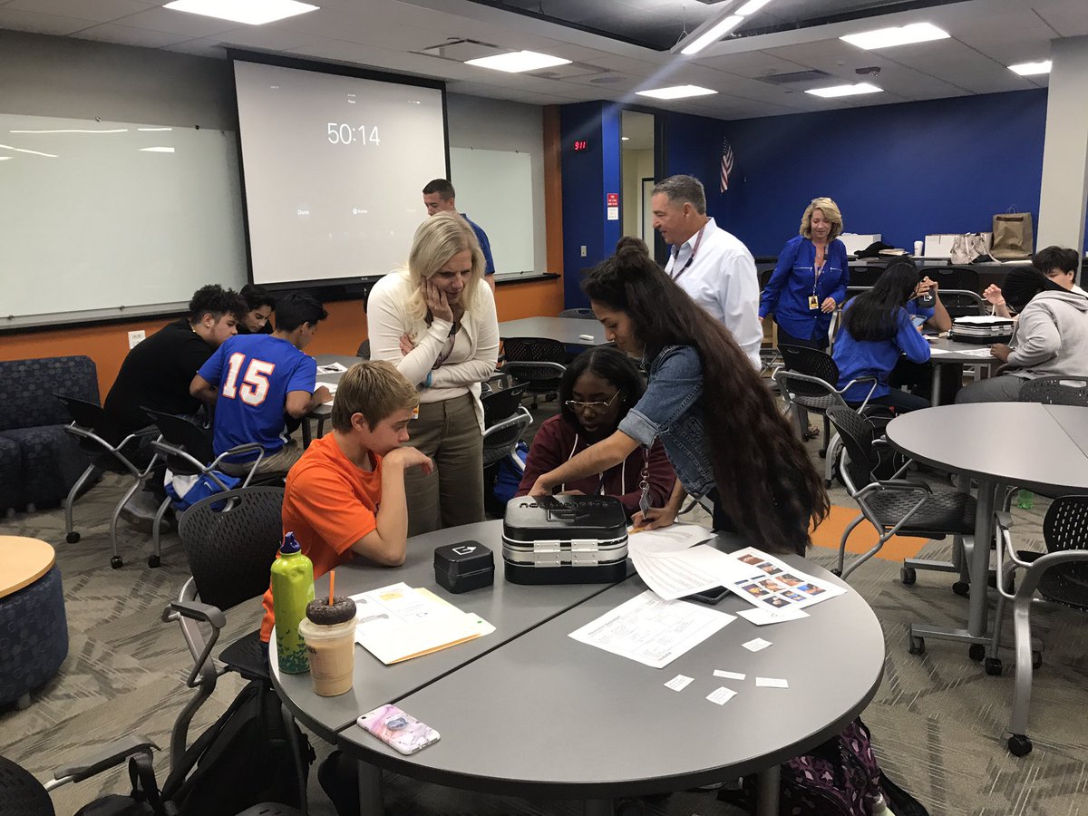 HEHSBusinessEd's tweet photo. Business Incubator students try to solve problems to break into these boxes!  #teamwork #breakoutedu #HoffmanHawks. @D211Inc https://t.co/z370s2iv9G