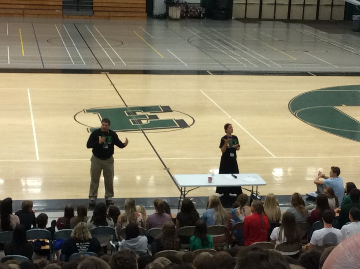 DCESeniorHigh's tweet photo. The entire student body squeezed into the gym to hear from students past and present. #EverestPride #DCEWeAreOne https://t.co/rqIJfbj7A0