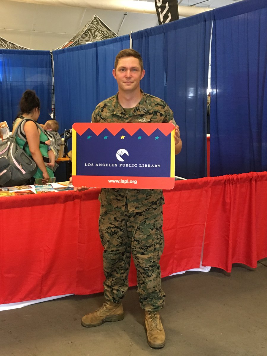 Person holding giant library card