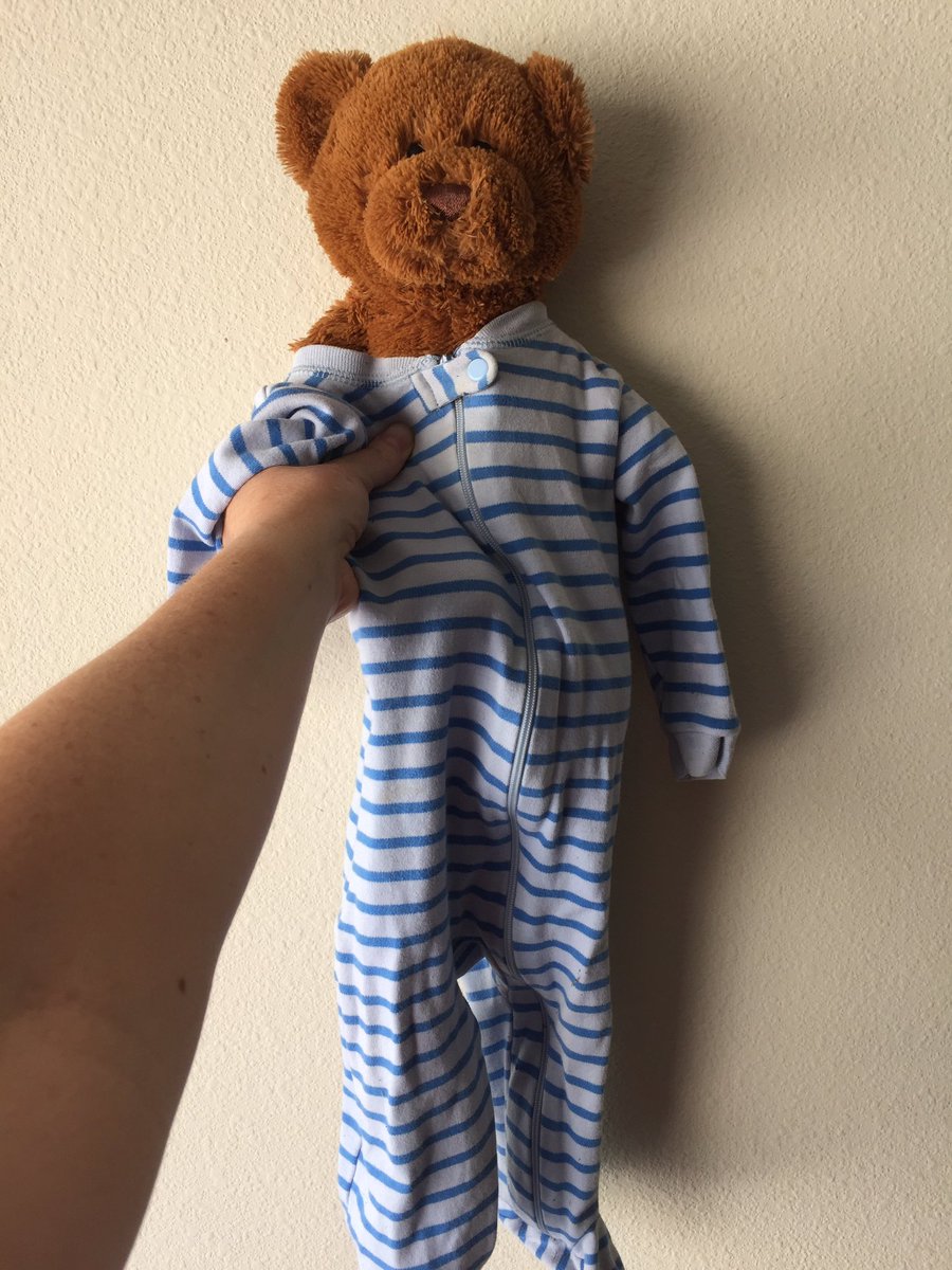 Not on my watch, little pajama bear. Found this guy in Webster, TX near Rudy's, Fry's, and Academy. Help me find the owner?