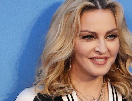 ottawasuncom's tweet photo. Madonna moves to Portugal https://t.co/d8YNfxCLDm https://t.co/KyJUt7uSFk
