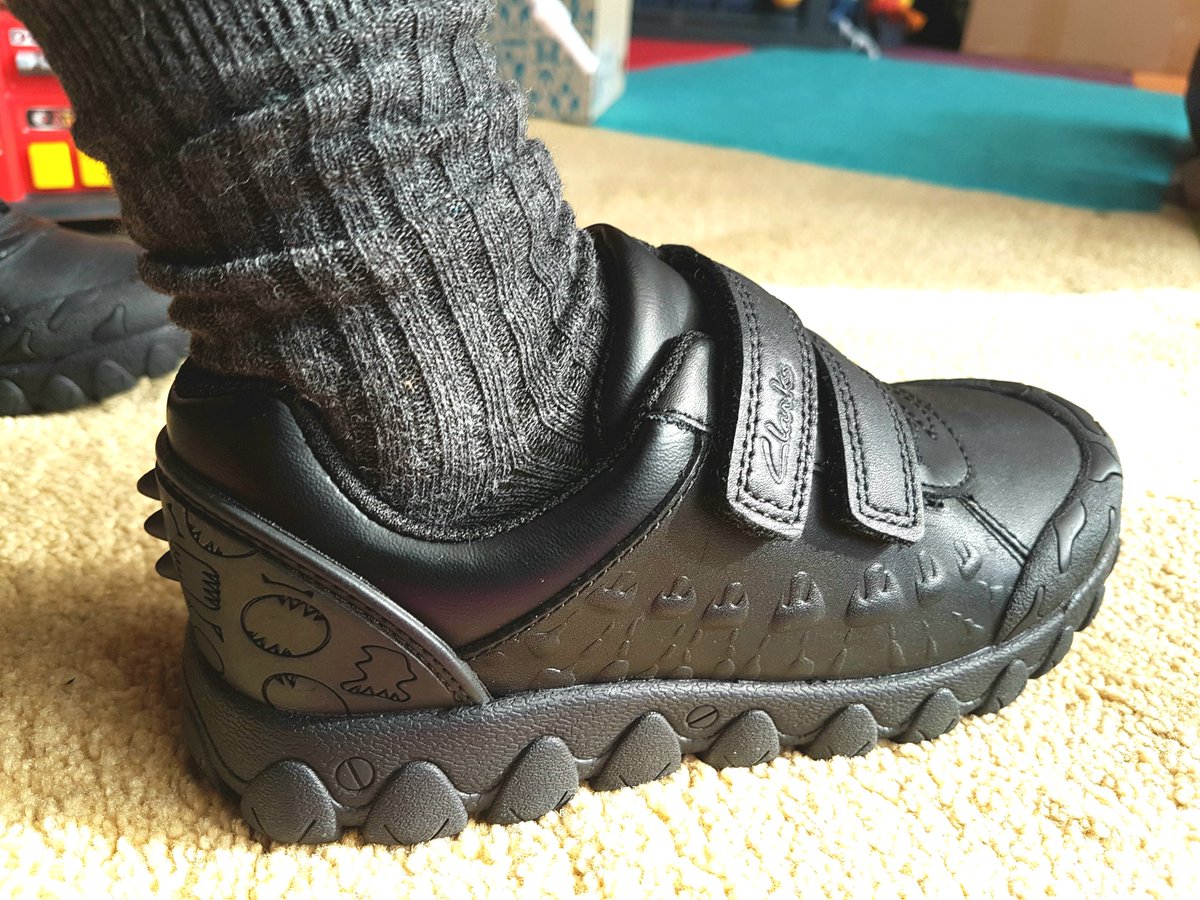 A_WorkingMum's tweet photo. Last minute school shoe shopping choices😩:
a) dinosaur shoes, one size too big 
b) correctly fitting non-dinosaur shoes. 
His feet will grow https://t.co/QZiZ6zGOtM